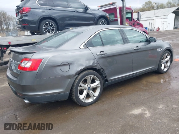 2011 Ford Taurus SHO with VIN 1FAHP2KT8BG100347, listed as a IAAI auction lot 41964597 with 104,603 mi miles and . Bid and sale history available at DreamBid. Image 4.