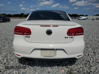 2013 Volkswagen Eos Sport с VIN WVWBW8AH8DV001948, выставлен на аукционе Copart как лот 56292615 с пробегом 75 398 миль миль и На запчасти • Non repairable. История ставок и продаж доступна на DreamBid. Изображение 6.