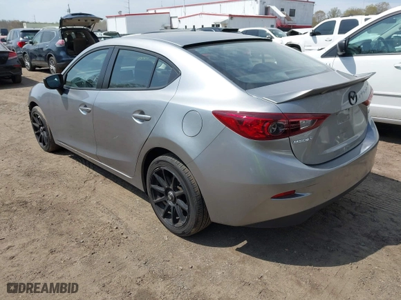 2016 Mazda Mazda3 i Sport with VIN JM1BM1T71G1335980, listed as a IAAI auction lot 42003186 with 131,015 mi miles. Bid and sale history available at carsss.com. Image 3.