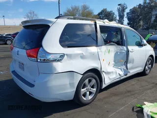2012 Toyota Sienna LE AAS with VIN 5TDKK3DCXCS276325, listed as a IAAI auction lot 41791385 with 133,635 mi miles. Bid and sale history available at carsss.com. Image 12.