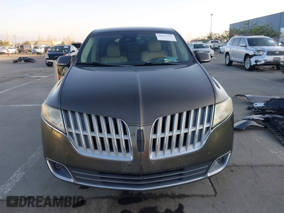 2011 Lincoln MKT with VIN 2LMHJ5AR8BBJ54371, listed as a IAAI auction lot 41147331 with 111,347 mi miles and . Bid and sale history available at DreamBid. Image 12.
