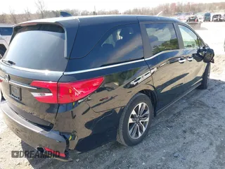 2022 Honda Odyssey EX-L with VIN 5FNRL6H72NB002554, listed as a IAAI auction lot 41932297 with 23,533 mi miles and . Bid and sale history available at DreamBid. Image 4.
