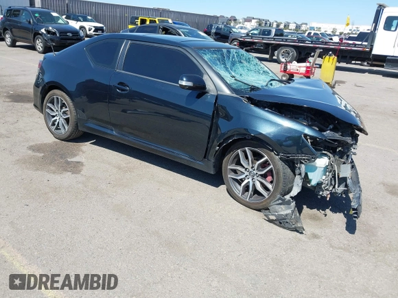 2015 Scion tC with VIN JTKJF5C77F3094936, listed as a IAAI auction lot 41830668 with 89,727 mi miles. Bid and sale history available at carsss.com. Image 1.