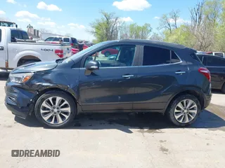 2017 Buick Encore Essence with VIN KL4CJCSB4HB012026, listed as a IAAI auction lot 41974604 with 139,467 mi miles and . Bid and sale history available at carsss.com. Image 14.