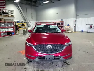2018 Mazda CX-5 Touring z VIN JM3KFBCM5J0462676, wystawiony jako Copart lot #57892015 z przebiegiem 76 566 mil mil oraz Szkoda całkowita • Salvage title. Historia ofert i sprzedaży dostępna na DreamBid. Obrazek 14.