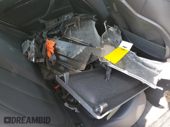 2021 BMW X1 xDrive28i with VIN WBXJG9C09M5S52289, listed as a Copart auction lot 64413105 with Not provided miles and Salvage title. Bid and sale history available at DreamBid. Image 12.