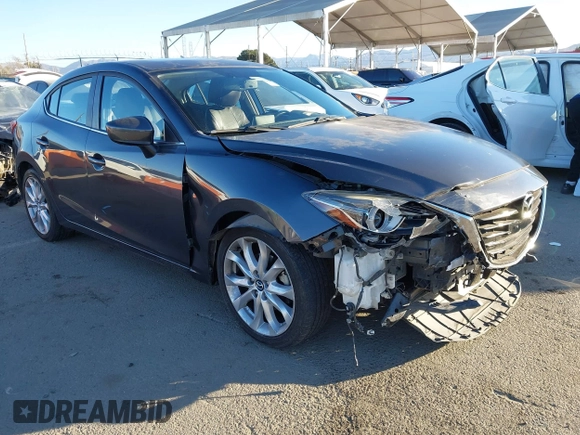2014 Mazda 3 S Grand Touring with VIN JM1BM1W36E1112033, listed as a IAAI auction lot 41412655 with 115,050 mi miles and . Bid and sale history available at DreamBid. Image 1.