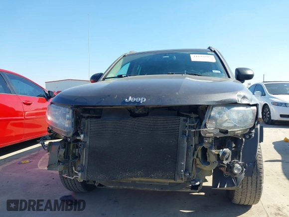2015 Jeep Compass Sport with VIN 1C4NJCBBXFD274472, listed as a IAAI auction lot 41629585 with 124,407 mi miles. Bid and sale history available at carsss.com. Image 6.