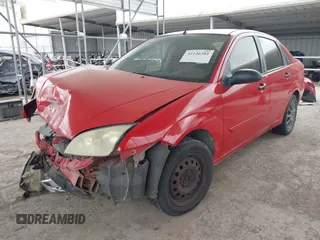 2007 Ford Focus S z VIN 1FAFP34N07W282022, wystawiony jako IAAI lot #42126281 z przebiegiem Nie podano mil oraz . Historia ofert i sprzedaży dostępna na DreamBid. Obrazek 2.