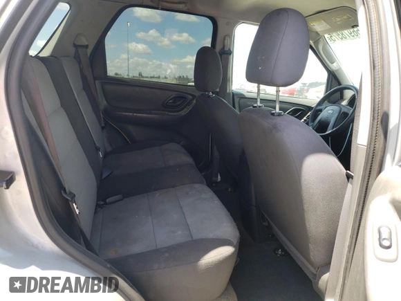 2007 Ford Escape XLS z VIN 1FMYU02Z97KC06172, wystawiony jako Copart lot #56978575 z przebiegiem 155 456 mil mil oraz Szkoda całkowita • Salvage title. Historia ofert i sprzedaży dostępna na DreamBid. Obrazek 11.