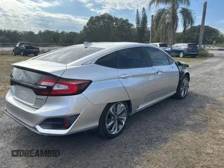 2019 Honda Clarity Plug-In Hybrid with VIN JHMZC5F14KC002619, listed as a Copart auction lot 86870694 with 53,911 mi miles and Salvage Title. Bid and sale history available at carsss.com. Image 4.