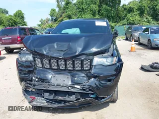2018 Jeep Grand Cherokee Upland with VIN 1C4RJFAG2JC350975, listed as a IAAI auction lot 42612836 with 148,435 mi miles and . Bid and sale history available at DreamBid. Image 12.