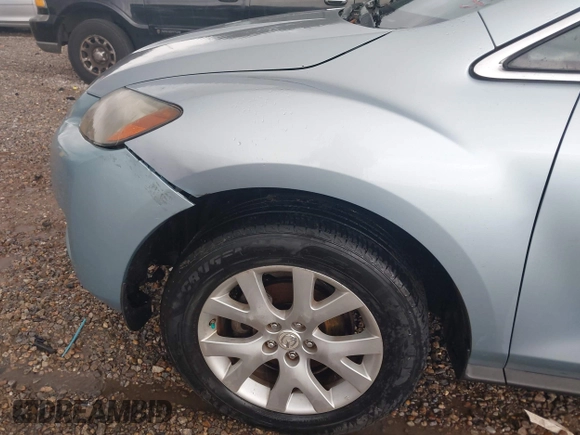2007 Mazda CX-7 Sport z VIN JM3ER293770117080, wystawiony jako IAAI lot #42197144 z przebiegiem 161 754 mil mil oraz . Historia ofert i sprzedaży dostępna na DreamBid. Obrazek 6.