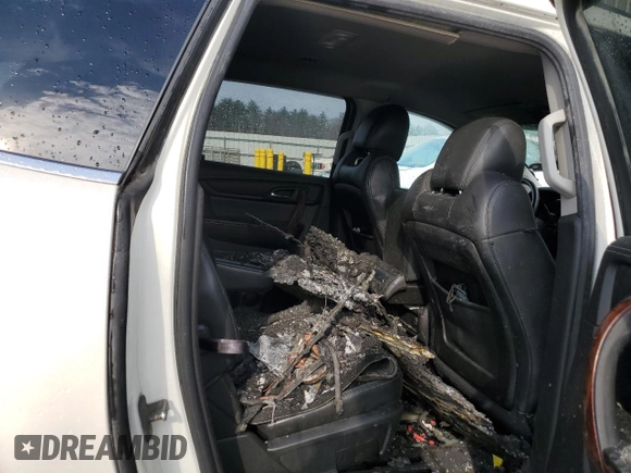 2014 Chevrolet Traverse LTZ z VIN 1GNKVJKD9EJ231164, wystawiony jako Copart lot #52876665 z przebiegiem Nie podano mil oraz Szkoda całkowita • Salvage title. Historia ofert i sprzedaży dostępna na DreamBid. Obrazek 11.