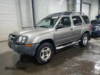 2004 Nissan Xterra XE z VIN 5N1ED28YX4C650888, wystawiony jako Copart lot #57151695 z przebiegiem 142 210 mil mil oraz Szkoda całkowita • Salvage title. Historia ofert i sprzedaży dostępna na DreamBid. Obrazek 1.