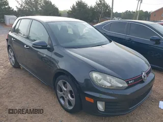 2012 Volkswagen GTI Autobahn with VIN WVWHD7AJ2CW306044, listed as a IAAI auction lot 41952372 with 94,659 mi miles and . Bid and sale history available at DreamBid. Image 1.
