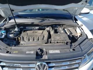 2018 Volkswagen Tiguan S with VIN 3VV1B7AX1JM015870, listed as a IAAI auction lot 41632032 with 82,578 mi miles. Bid and sale history available at carsss.com. Image 10.