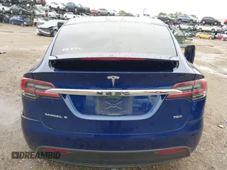 2018 Tesla Model X 75D with VIN 5YJXCAE2XJF111180, listed as a IAAI auction lot 41988079 with 114,593 mi miles and . Bid and sale history available at DreamBid. Image 16.
