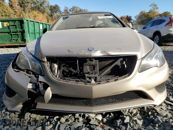2016 Mercedes-Benz E 400 with VIN WDDKK6FF8GF334288, listed as a Copart auction lot 77405814 with 115,728 mi miles and Salvage Title. Bid and sale history available at carsss.com. Image 5.