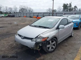 2008 Honda Civic Cpe EX-L with VIN 2HGFG12938H546744, listed as a IAAI auction lot 41526059 with 232,981 mi miles. Bid and sale history available at carsss.com. Image 2.