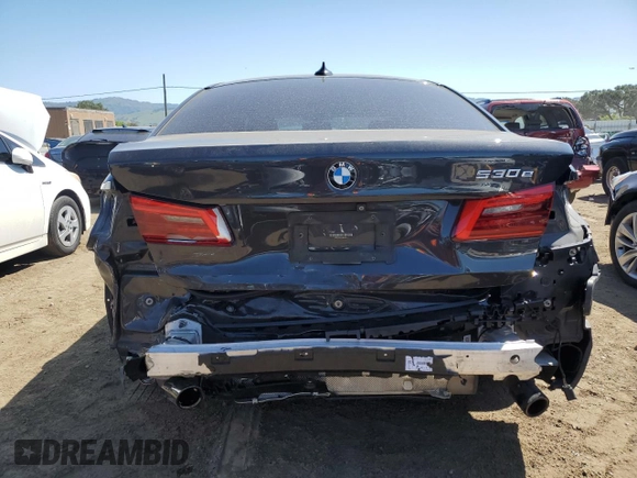 2018 BMW 5 Series 530e with VIN WBAJA9C52JB249402, listed as a Copart auction lot 55093055 with 117,033 mi miles and Salvage title. Bid and sale history available at DreamBid. Image 6.
