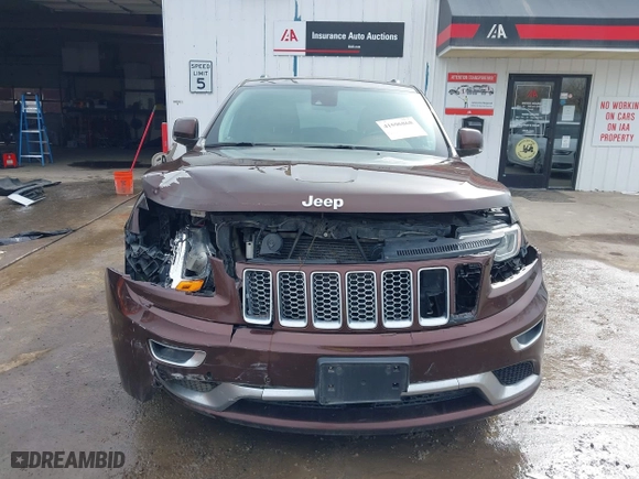 2015 Jeep Grand Cherokee Summit with VIN 1C4RJFJT7FC840560, listed as a IAAI auction lot 41596868 with 173,392 mi miles. Bid and sale history available at carsss.com. Image 12.