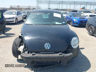 2013 Volkswagen Beetle 2.5L with VIN 3VWHX7AT3DM603962, listed as a IAAI auction lot 42329256 with 137,285 mi miles and . Bid and sale history available at DreamBid. Image 12.