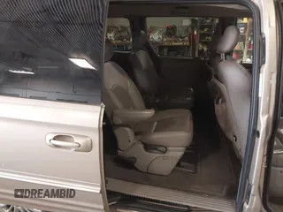 2003 Chrysler Town & Country Limited with VIN 2C8GP64L23R252570, listed as a IAAI auction lot 41940529 with 105,780 mi miles. Bid and sale history available at carsss.com. Image 8.