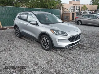 2020 Ford Escape SEL z VIN 1FMCU9H65LUA37178, wystawiony jako IAAI lot #42150999 z przebiegiem 107 722 mil mil oraz . Historia ofert i sprzedaży dostępna na DreamBid. Obrazek 1.