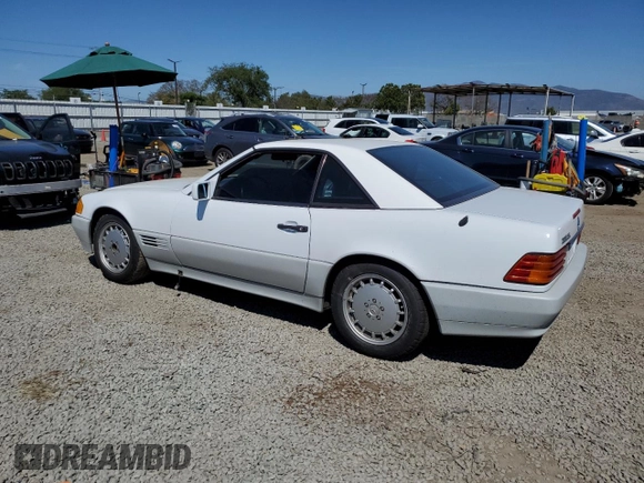 1992 Mercedes-Benz 500 z VIN WDBFA66E7NF049079, wystawiony jako Copart lot #52642285 z przebiegiem 69 976 mil mil oraz Szkody całkowita. Historia ofert i sprzedaży dostępna na DreamBid. Obrazek 2.