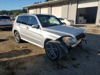 2014 Mercedes-Benz GLK 350 with VIN WDCGG5HBXEG210062, listed as a Copart auction lot 74727644 with 160,984 mi miles and Salvage Title. Bid and sale history available at DreamBid. Image 4.