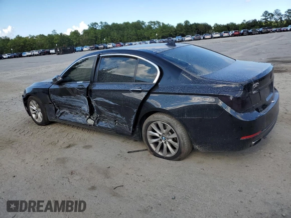 2015 BMW 7 Series 740Li with VIN WBAYE4C58FD138919, listed as a Copart auction lot 69409074 with 145,549 mi miles and Salvage Title. Bid and sale history available at DreamBid. Image 2.