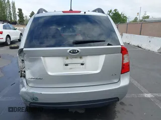 2009 Kia Rondo LX with VIN KNAFG528497222225, listed as a IAAI auction lot 42108192 with 113,040 mi miles. Bid and sale history available at carsss.com. Image 17.