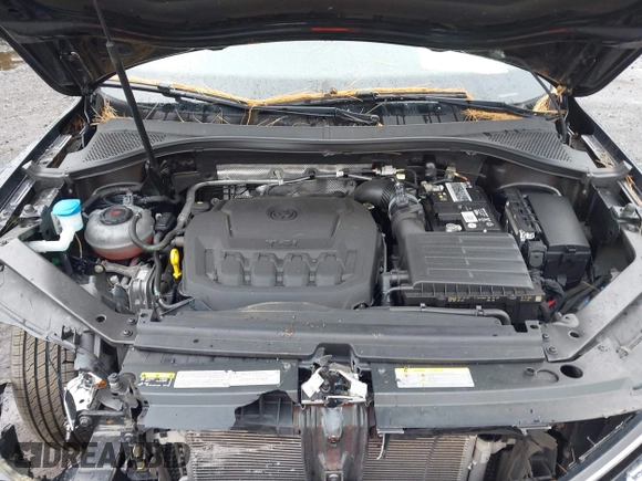 2021 Volkswagen Tiguan S z VIN 3VV0B7AX3MM031908, wystawiony jako IAAI lot #42504384 z przebiegiem 42 510 mil mil oraz . Historia ofert i sprzedaży dostępna na DreamBid. Obrazek 10.