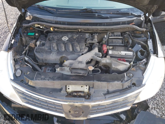 2007 Nissan Versa SL z VIN 3N1BC13E77L439385, wystawiony jako IAAI lot #41749821 z przebiegiem 137 521 mil mil oraz . Historia ofert i sprzedaży dostępna na DreamBid. Obrazek 10.