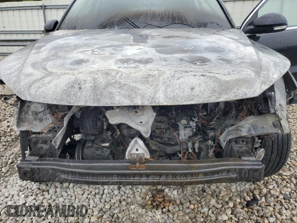 2015 Volkswagen Tiguan SE z VIN WVGBV7AXXFW606017, wystawiony jako Copart lot #51005745 z przebiegiem Nie podano mil oraz Szkoda całkowita • Salvage title. Historia ofert i sprzedaży dostępna na DreamBid. Obrazek 11.