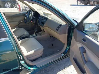 2001 Honda Civic LX with VIN 2HGES16551H567764, listed as a IAAI auction lot 41908288 with 137,740 mi miles. Bid and sale history available at carsss.com. Image 5.
