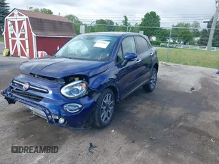 2021 FIAT 500X Trekking with VIN ZFBNF3B10MP945509, listed as a IAAI auction lot 42299963 with 35,474 mi miles and . Bid and sale history available at DreamBid. Image 2.