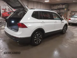 2022 Volkswagen Tiguan S with VIN 3VV0B7AX1NM066089, listed as a IAAI auction lot 41686335 with 64,115 mi miles. Bid and sale history available at carsss.com. Image 4.