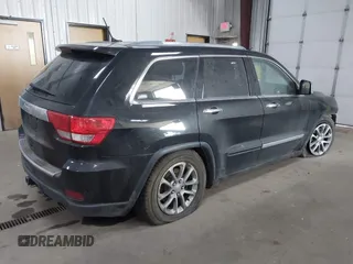 2013 Jeep Grand Cherokee Overland with VIN 1C4RJFCT7DC524005, listed as a IAAI auction lot 42116097 with 126,942 mi miles. Bid and sale history available at carsss.com. Image 4.