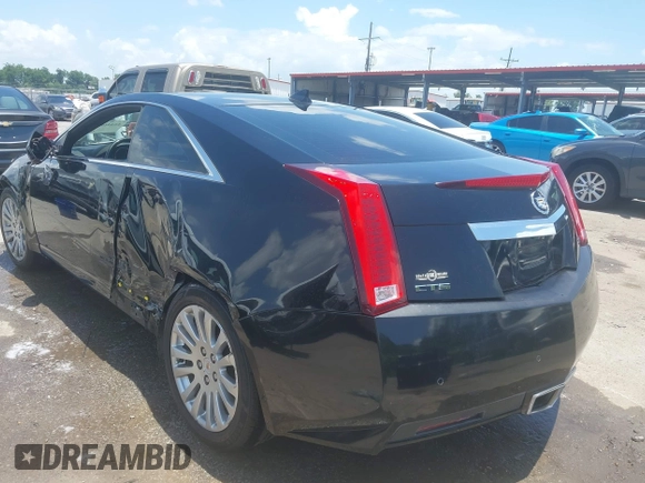 2012 Cadillac CTS Performance z VIN 1G6DJ1E31C0139231, wystawiony jako IAAI lot #42446853 z przebiegiem 102 857 mil mil oraz . Historia ofert i sprzedaży dostępna na DreamBid. Obrazek 3.