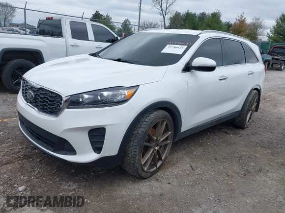 2019 Kia Sorento LX with VIN 5XYPG4A30KG524272, listed as a IAAI auction lot 41786623 with 124,942 mi miles and . Bid and sale history available at carsss.com. Image 2.