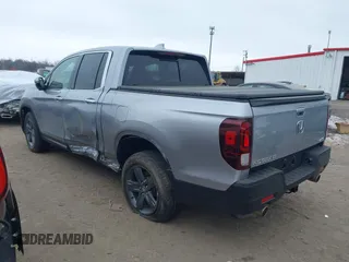 2021 Honda Ridgeline RTL-E with VIN 5FPYK3F79MB010091, listed as a IAAI auction lot 41386318 with 37,996 mi miles and . Bid and sale history available at DreamBid. Image 3.