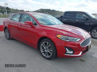 2020 Ford Fusion Hybrid Titanium with VIN 3FA6P0RU7LR156915, listed as a IAAI auction lot 40738652 with 82,836 mi miles. Bid and sale history available at carsss.com. Image 1.
