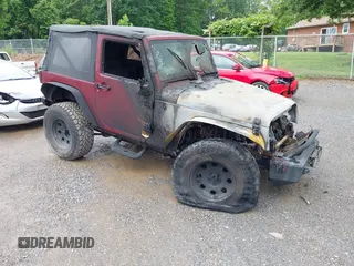 2012 Jeep Wrangler Sport with VIN 1C4AJWAG9CL203018, listed as a IAAI auction lot 42377899 with Not provided miles and . Bid and sale history available at DreamBid. Image 1.