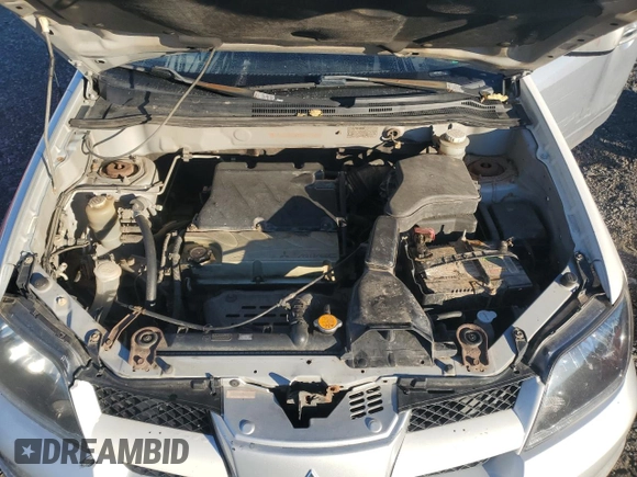 2004 Mitsubishi Outlander LS z VIN JA4LZ31F74U028300, wystawiony jako Copart lot #76228644 z przebiegiem 174 424 mil mil oraz Szkoda całkowita • Salvage title. Historia ofert i sprzedaży dostępna na DreamBid. Obrazek 12.