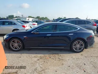 2014 Tesla Model S 60 with VIN 5YJSA1H12EFP39873, listed as a IAAI auction lot 42443414 with 132,773 mi miles and . Bid and sale history available at DreamBid. Image 14.