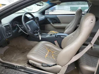 1997 Chevrolet Camaro Z28 z VIN 2G1FP22P6V2156828, wystawiony jako Copart lot #57651625 z przebiegiem 131 803 mil mil oraz Szkoda całkowita • Salvage title. Historia ofert i sprzedaży dostępna na DreamBid. Obrazek 7.
