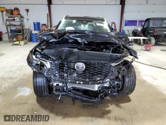 2025 Mazda CX-90 Select z VIN JM3KKAHD1S1201605, wystawiony jako Copart lot #58155135 z przebiegiem Nie podano mil oraz Szkody całkowita. Historia ofert i sprzedaży dostępna na DreamBid. Obrazek 5.