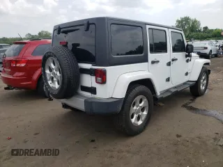 2015 Jeep Wrangler Unlimited Sahara z VIN 1C4BJWEG6FL627890, wystawiony jako Copart lot #58080945 z przebiegiem 145 941 mil mil oraz Szkoda całkowita • Salvage title. Historia ofert i sprzedaży dostępna na DreamBid. Obrazek 3.